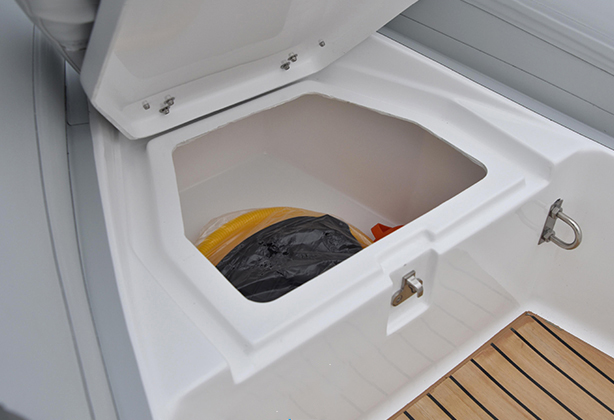 Waterproof storage box integrated into the bow of the Liya 12.5 ft high-speed tender, offering secure and accessible storage