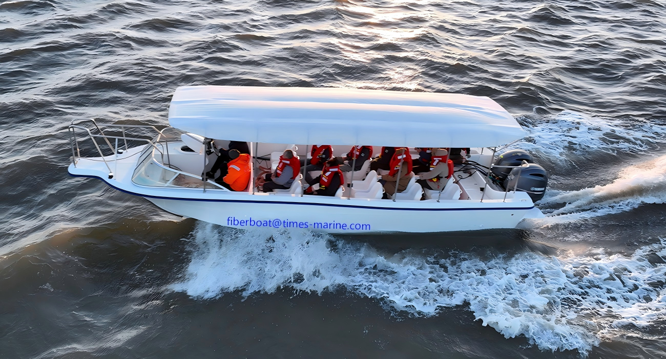 TM 30ft Fiberglass Sightseeing Boat on a Coastal Tour