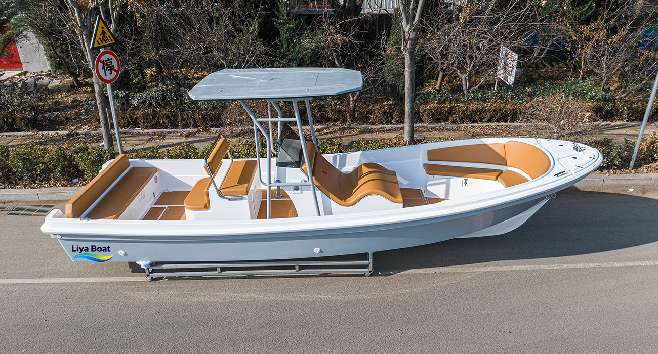 Sun lounger leisure configuration on 25ft panga boat with bow cushions and removable table
